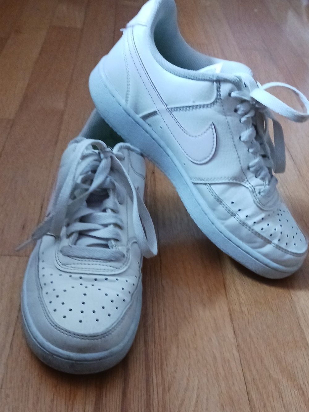 Nike Women's White Low-Top Leather Sneakers with Subtle Pink and Gray Accents
